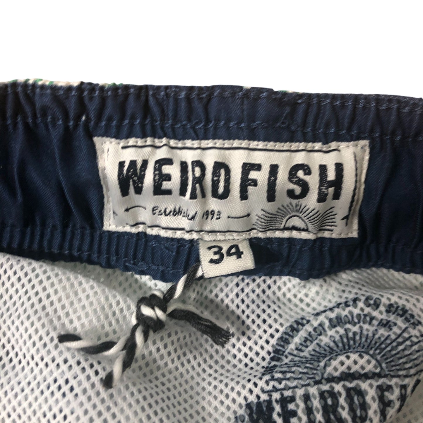 Weird Fish Bellukha 34 Men's Swim Shorts Green Floral Print Recycled Polyester