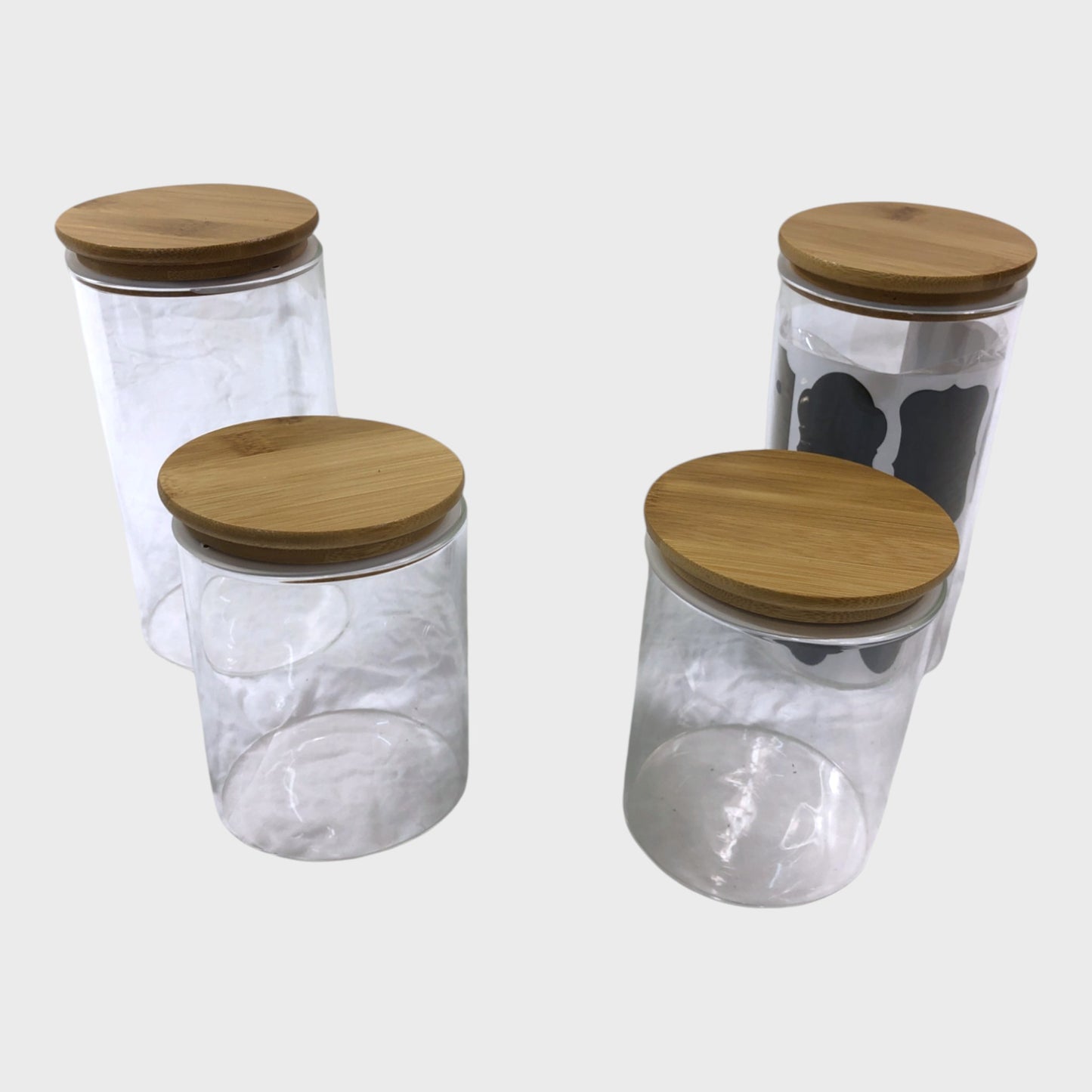 Four Storage Glass Jars